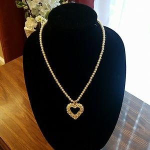 Pearl necklace with heart pendant